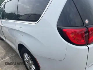 2021 Chrysler Voyager LXi with VIN 2C4RC1DG3MR555063, listed as a IAAI auction lot 42250065 with 61,023 mi miles and . Bid and sale history available at DreamBid. Image 1.