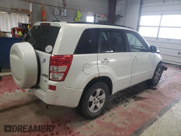 2006 Suzuki Grand Vitara Premium z VIN JS3TD943164101223, wystawiony jako Copart lot #43979705 z przebiegiem 147 813 mil mil oraz Czysty tytuł • Clean title. Historia ofert i sprzedaży dostępna na DreamBid. Obrazek 3.