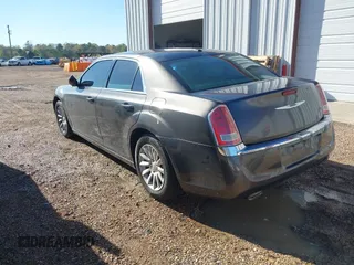 2014 Chrysler 300 with VIN 2C3CCAAG2EH327934, listed as a IAAI auction lot 41875056 with 241,599 mi miles. Bid and sale history available at carsss.com. Image 3.