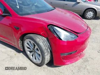 2022 Tesla Model 3 Long Range z VIN 5YJ3E1EB5NF174606, wystawiony jako IAAI lot #42463894 z przebiegiem 36 677 mil mil oraz . Historia ofert i sprzedaży dostępna na DreamBid. Obrazek 20.
