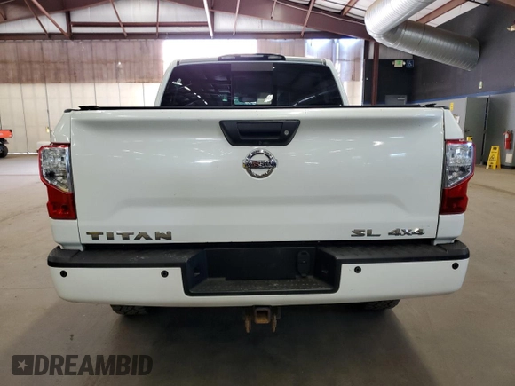 2017 Nissan Titan Pro-4X z VIN 1N6AA1E59HN504294, wystawiony jako Copart lot #65590525 z przebiegiem 160 695 mil mil oraz Czysty tytuł • Clean title. Historia ofert i sprzedaży dostępna na DreamBid. Obrazek 6.