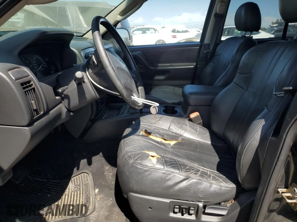 2004 Jeep Grand Cherokee Laredo with VIN 1J4GW48S84C182135, listed as a Copart auction lot 62224975 with 187,938 mi miles and Clean title. Bid and sale history available at DreamBid. Image 7.