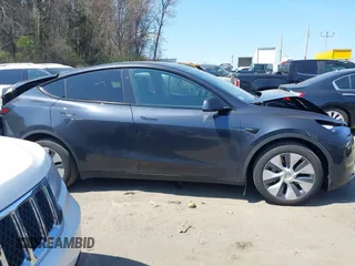 2024 Tesla Model Y Long Range with VIN 7SAYGDEE6RA225161, listed as a IAAI auction lot 42083140 with 28,289 mi miles and . Bid and sale history available at DreamBid. Image 13.