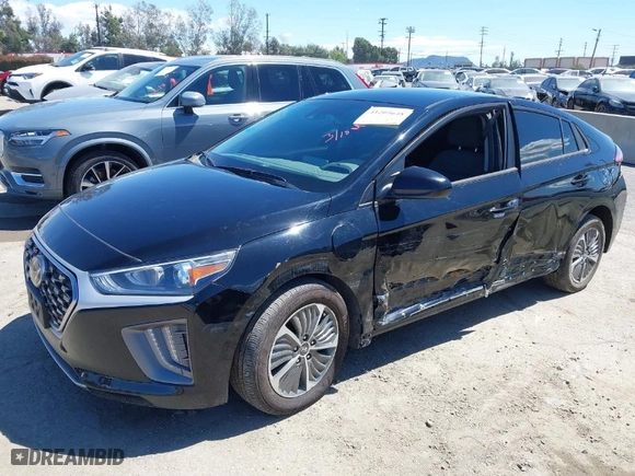2022 Hyundai Ioniq Plug-In Hybrid SE with VIN KMHC65LD1NU268798, listed as a IAAI auction lot 41205648 with 68,798 mi miles. Bid and sale history available at carsss.com. Image 2.