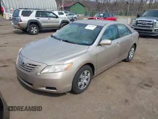 2009 Toyota Camry with VIN 4T1BE46K99U834926, listed as a IAAI auction lot 41853947 with 214,044 mi miles. Bid and sale history available at carsss.com. Image 2.