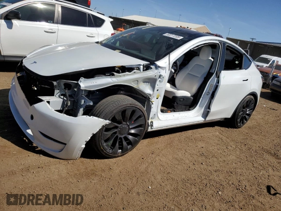 2024 Tesla Model Y Performance with VIN 7SAYGDEF6RA284171, listed as a Copart auction lot 50317205 with 6,870 mi miles and Salvage Title. Bid and sale history available at DreamBid. Image 1.
