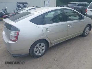2005 Toyota Prius z VIN JTDKB20U257051452, wystawiony jako IAAI lot #42451660 z przebiegiem 166 106 mil mil oraz . Historia ofert i sprzedaży dostępna na DreamBid. Obrazek 4.