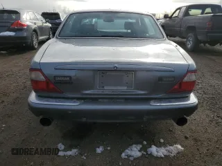 2002 Jaguar XJ with VIN SAJFA12C72LF47096, listed as a Copart auction lot 79412794 with 287,060 mi miles and Clean Title. Bid and sale history available at DreamBid. Image 6.