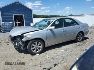 2005 Toyota Camry LE with VIN 4T1BE30K15U086072, listed as a Copart auction lot 65773915 with 203,106 mi miles and Clean title. Bid and sale history available at DreamBid. Image 1.