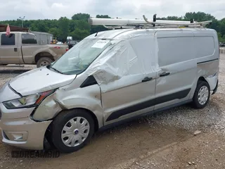 2021 Ford Transit Connect XLT z VIN NM0LS7F29M1503029, wystawiony jako IAAI lot #42556379 z przebiegiem 80 738 mil mil oraz . Historia ofert i sprzedaży dostępna na DreamBid. Obrazek 6.
