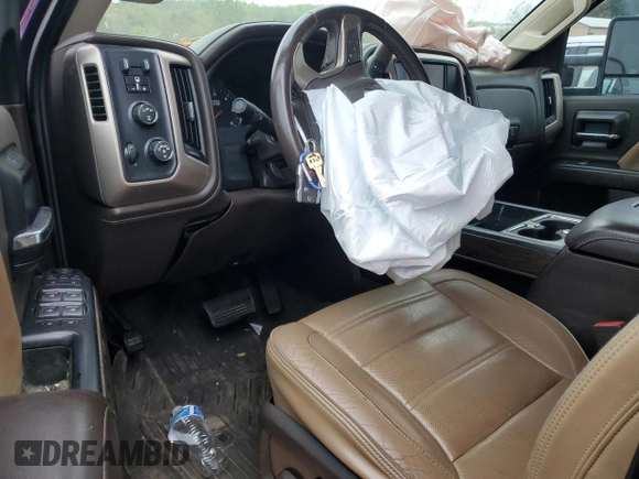 2017 GMC Sierra 2500HD Denali z VIN 1GT12UEG4HF127967, wystawiony jako Copart lot #51812665 z przebiegiem Nie podano mil oraz Szkoda całkowita • Salvage title. Historia ofert i sprzedaży dostępna na DreamBid. Obrazek 8.