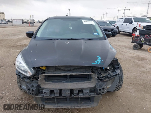 2018 Ford Focus SE with VIN 1FADP3F28JL302634, listed as a IAAI auction lot 42103219 with 71,682 mi miles and . Bid and sale history available at DreamBid. Image 13.
