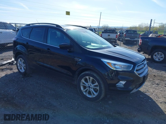 2018 Ford Escape SE z VIN 1FMCU9GD5JUB15259, wystawiony jako IAAI lot #42182040 z przebiegiem 122 194 mil mil oraz . Historia ofert i sprzedaży dostępna na DreamBid. Obrazek 1.