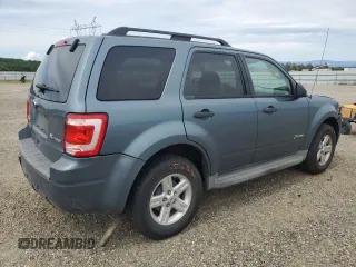 2010 Ford Escape Hybrid z VIN 1FMCU4K35AKB31202, wystawiony jako Copart lot #52922525 z przebiegiem 152 303 mil mil oraz Szkoda całkowita • Salvage title. Historia ofert i sprzedaży dostępna na DreamBid. Obrazek 3.