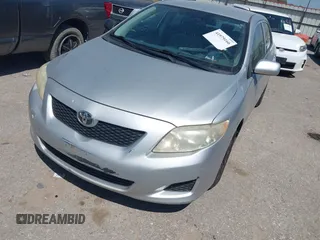 2009 Toyota Corolla with VIN JTDBL40E499062948, listed as a IAAI auction lot 41979166 with 131,535 mi miles. Bid and sale history available at carsss.com. Image 2.