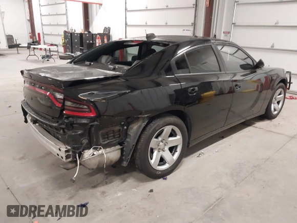 2022 Dodge Charger Police with VIN 2C3CDXAT6NH110044, listed as a IAAI auction lot 41292387 with 59,324 mi miles and . Bid and sale history available at DreamBid. Image 4.