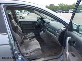 2007 Honda CR-V LX with VIN JHLRE48317C057561, listed as a IAAI auction lot 42119266 with 307,373 mi miles. Bid and sale history available at carsss.com. Image 5.
