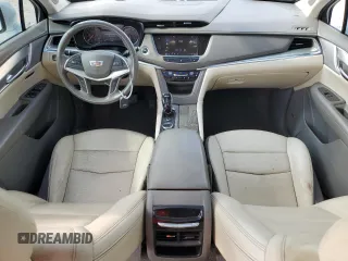 2021 Cadillac XT5 FWD Premium Luxury z VIN 1GYKNCR48MZ136597, wystawiony jako Copart lot #79694104 z przebiegiem 52 504 mil mil oraz Szkoda całkowita • Salvage title. Historia ofert i sprzedaży dostępna na DreamBid. Obrazek 8.