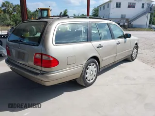 1999 Mercedes-Benz E-Class with VIN WDBJH65F3XA845635, listed as a IAAI auction lot 42102122 with 215,678 mi miles. Bid and sale history available at carsss.com. Image 4.