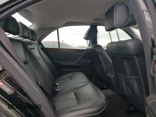 2002 Mercedes-Benz E-Class with VIN WDBJF65J42B486633, listed as a Copart auction lot 76979054 with 151,429 mi miles and Salvage Title. Bid and sale history available at carsss.com. Image 10.
