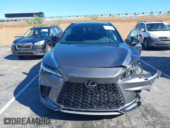 2023 Lexus RX 500h F Sport Performance z VIN 2T2BCMEA7PC007404, wystawiony jako IAAI lot #41742364 z przebiegiem 9 667 mil mil oraz . Historia ofert i sprzedaży dostępna na DreamBid. Obrazek 12.