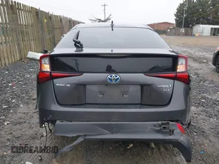 2019 Toyota Prius L Eco z VIN JTDKARFU8K3085918, wystawiony jako IAAI lot #41107891 z przebiegiem 166 295 mil mil oraz . Historia ofert i sprzedaży dostępna na DreamBid. Obrazek 16.