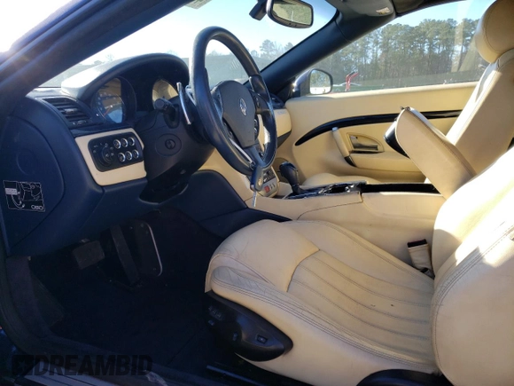 2011 Maserati GranTurismo Convertible with VIN ZAM45KMA9B0054803, listed as a Copart auction lot 48870465 with 77,136 mi miles and Salvage Title. Bid and sale history available at carsss.com. Image 7.