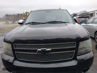 2011 Chevrolet Suburban LTZ with VIN 1GNSCKE02BR206544, listed as a IAAI auction lot 41159341 with 218,202 mi miles. Bid and sale history available at carsss.com. Image 12.