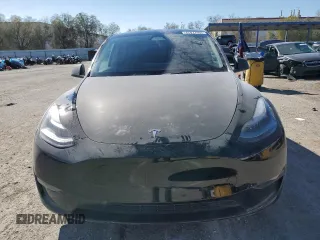 2023 Tesla Model Y Performance with VIN 7SAYGDEF7PF924355, listed as a Copart auction lot 47877055 with 64,663 mi miles and Salvage Title. Bid and sale history available at DreamBid. Image 5.