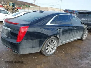 2017 Cadillac XTS Luxury z VIN 2G61M5S36H9111282, wystawiony jako IAAI lot #41107706 z przebiegiem 136 286 mil mil oraz . Historia ofert i sprzedaży dostępna na DreamBid. Obrazek 4.