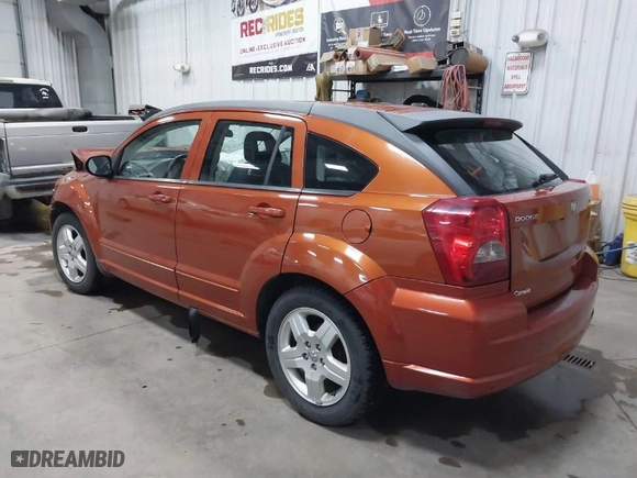2009 Dodge Caliber SXT with VIN 1B3HB48A39D233346, listed as a IAAI auction lot 41068002 with 100,306 mi miles. Bid and sale history available at carsss.com. Image 3.