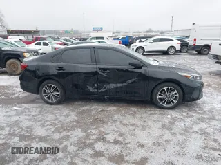 2023 Kia Forte LXS z VIN 3KPF24AD9PE511818, wystawiony jako IAAI lot #41554269 z przebiegiem 16 465 mil mil oraz . Historia ofert i sprzedaży dostępna na DreamBid. Obrazek 13.