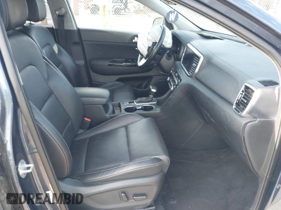 2021 Kia Sportage EX z VIN KNDPNCAC4M7897590, wystawiony jako IAAI lot #42183678 z przebiegiem 110 657 mil mil oraz . Historia ofert i sprzedaży dostępna na DreamBid. Obrazek 5.