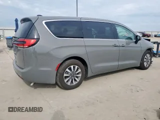 2023 Chrysler Pacifica Hybrid Touring L with VIN 2C4RC1L72PR614075, listed as a Copart auction lot 58586115 with 43,960 mi miles and Salvage title. Bid and sale history available at DreamBid. Image 3.