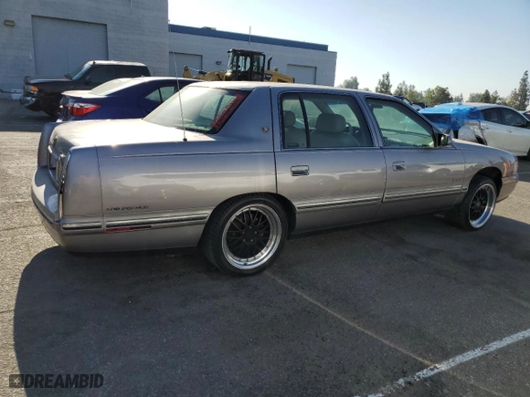 1997 Cadillac DeVille DHS with VIN 1G6KE54Y3VU299087, listed as a Copart auction lot 69035944 with 0 mi miles and Clean Title. Bid and sale history available at carsss.com. Image 3.