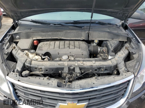 2017 Chevrolet Traverse LS with VIN 1GNKRFED0HJ310272, listed as a Copart auction lot 56943165 with Not provided miles and Salvage title. Bid and sale history available at DreamBid. Image 11.
