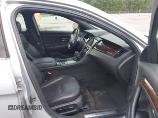 2013 Ford Taurus Limited with VIN 1FAHP2F87DG235392, listed as a IAAI auction lot 42431543 with 123,904 mi miles and . Bid and sale history available at DreamBid. Image 5.