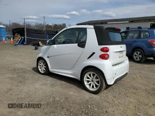 2013 Smart fortwo Passion z VIN WMEEK3BA6DK640099, wystawiony jako Copart lot #50757045 z przebiegiem 102 129 mil mil oraz Czysty tytuł • Clean title. Historia ofert i sprzedaży dostępna na DreamBid. Obrazek 2.