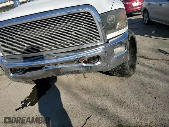 2012 Ram 2500 Laramie z VIN 3C6UD5FL5CG104673, wystawiony jako Copart lot #46175925 z przebiegiem 195 771 mil mil oraz Szkoda całkowita • Salvage title. Historia ofert i sprzedaży dostępna na DreamBid. Obrazek 11.