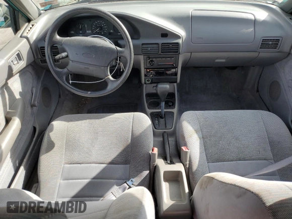 1995 Ford Escort z VIN 1FASP14J9SW128191, wystawiony jako Copart lot #75688724 z przebiegiem 85 423 mil mil oraz Czysty tytuł • Clean title. Historia ofert i sprzedaży dostępna na DreamBid. Obrazek 8.