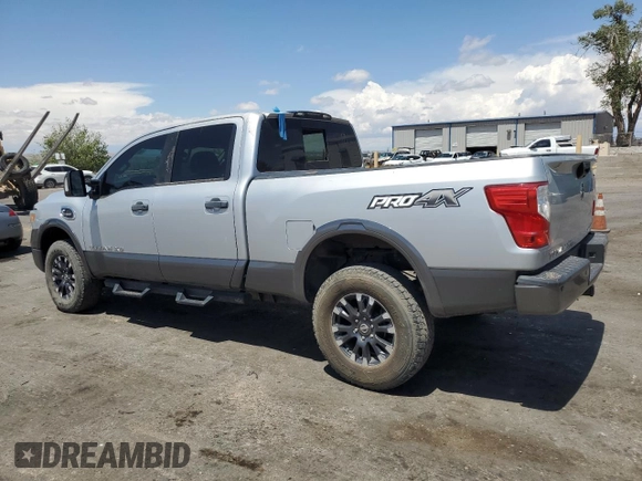 2017 Nissan Titan XD PRO-4X with VIN 1N6BA1F45HN525928, listed as a Copart auction lot 55773415 with 100,295 mi miles and Clean Title. Bid and sale history available at carsss.com. Image 2.