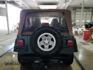 2002 Jeep Wrangler X with VIN 1J4FA39SX2P718415, listed as a Copart auction lot 52788015 with 152,093 mi miles and Salvage Title. Bid and sale history available at carsss.com. Image 6.