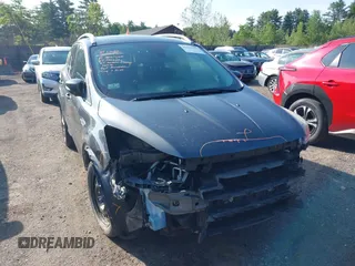 2016 Ford Escape Titanium with VIN 1FMCU9J99GUB27573, listed as a IAAI auction lot 42445457 with 156,784 mi miles and . Bid and sale history available at DreamBid. Image 13.