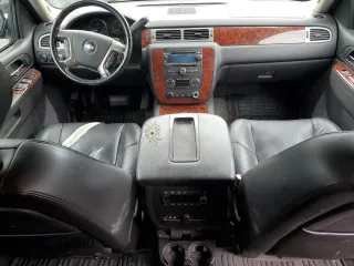 2010 Chevrolet Tahoe LTZ with VIN 1GNUKCE05AR164175, listed as a Copart auction lot 57223295 with 423,010 mi miles and Salvage title. Bid and sale history available at DreamBid. Image 8.
