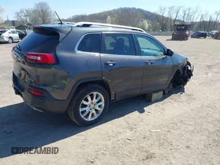 2014 Jeep Cherokee Limited with VIN 1C4PJMDSXEW309171, listed as a IAAI auction lot 42038729 with 74,973 mi miles. Bid and sale history available at carsss.com. Image 4.