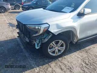 2018 GMC Terrain SLE with VIN 3GKALMEV7JL404266, listed as a IAAI auction lot 41990127 with 57,869 mi miles and . Bid and sale history available at DreamBid. Image 6.