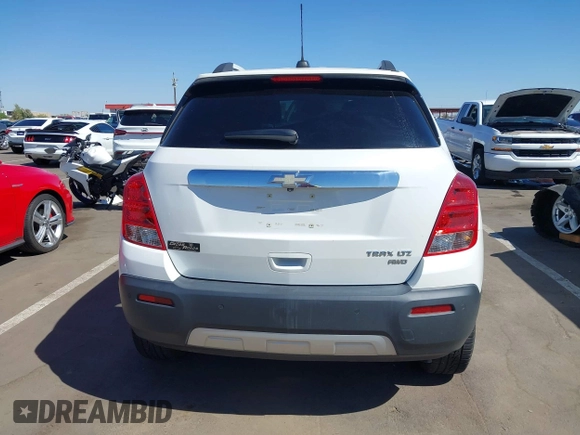 2015 Chevrolet Trax LTZ with VIN KL7CJTSBXFB236823, listed as a IAAI auction lot 42045817 with 138,930 mi miles. Bid and sale history available at carsss.com. Image 17.