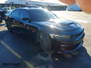 2021 Dodge Charger Scat Pack Widebody with VIN 2C3CDXGJ0MH578033, listed as a IAAI auction lot 40966770 with 61,216 mi miles. Bid and sale history available at carsss.com. Image 1.