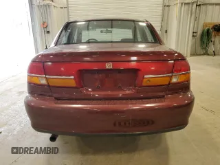 2001 Saturn LS z VIN 1G8JU52F51Y549021, wystawiony jako Copart lot #81109084 z przebiegiem 14 974 mil mil oraz Tytuł czysty. Historia ofert i sprzedaży dostępna na DreamBid. Obrazek 6.