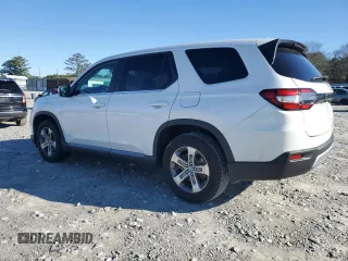 2023 Honda Pilot EX-L 8 Passenger with VIN 5FNYG2H49PB011916, listed as a Copart auction lot 87109874 with 12,461 mi miles and Salvage Title. Bid and sale history available at carsss.com. Image 2.